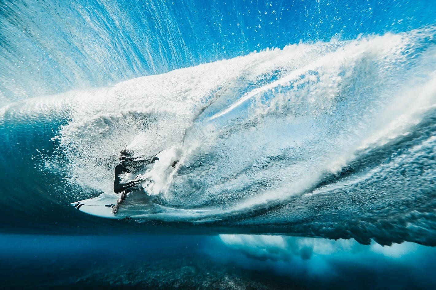 This image titled Energy by Ben Thouard is the 2019 Overall Winner & Energy Category winner of the RED BULL ILLUME , the world’s best adventure and action sports imagery contest. This image captures surfer Ace Buchan in action in Tahiti, French Polynesia. Photo by Ben Thouard and Red Bull Illume.